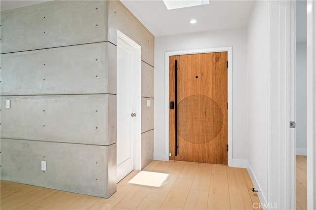16701 Kalisher, Granada Hills, CA 91344 - hall with wood finished floors, recessed lighting, and a skylight