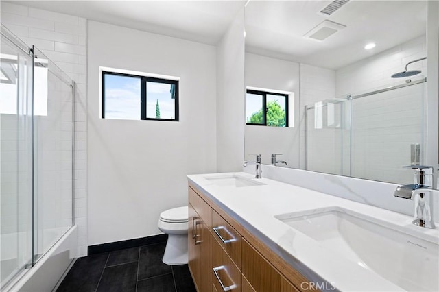 16701 Kalisher, Granada Hills, CA 91344 - full bath featuring double vanity, tile patterned flooring, bath / shower combo with glass door, and recessed lighting