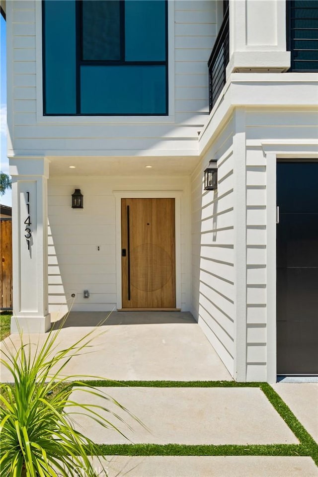 16701 Kalisher, Granada Hills, CA 91344 - doorway to property with a garage