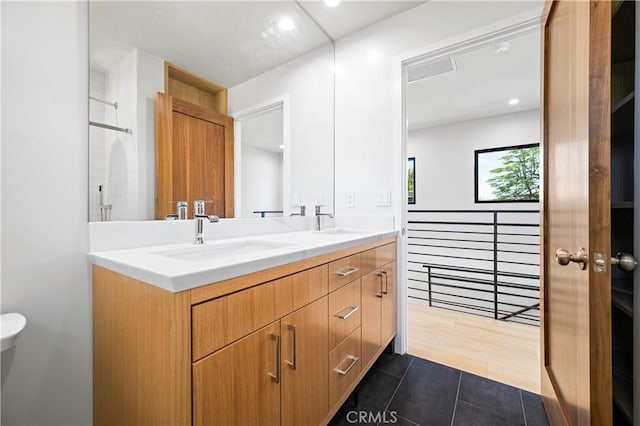 16701 Kalisher, Granada Hills, CA 91344 - bathroom with double vanity, tile patterned floors, and recessed lighting