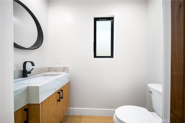 16701 Kalisher, Granada Hills, CA 91344 - half bath featuring vanity and wood finished floors