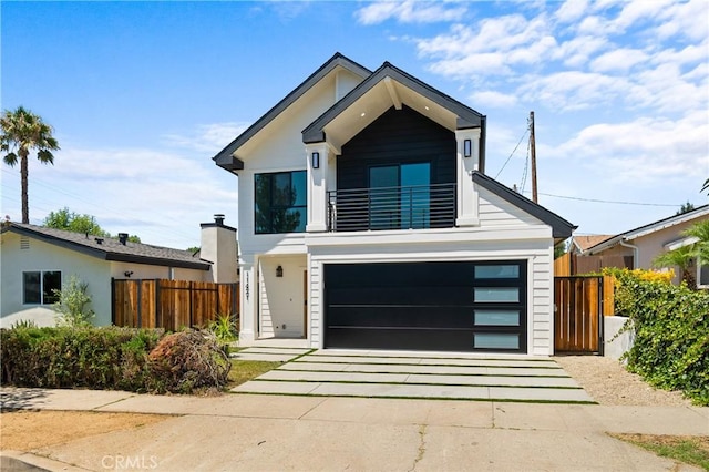 16701 Kalisher, Granada Hills, CA 91344 - contemporary house with a balcony, driveway, and a garage