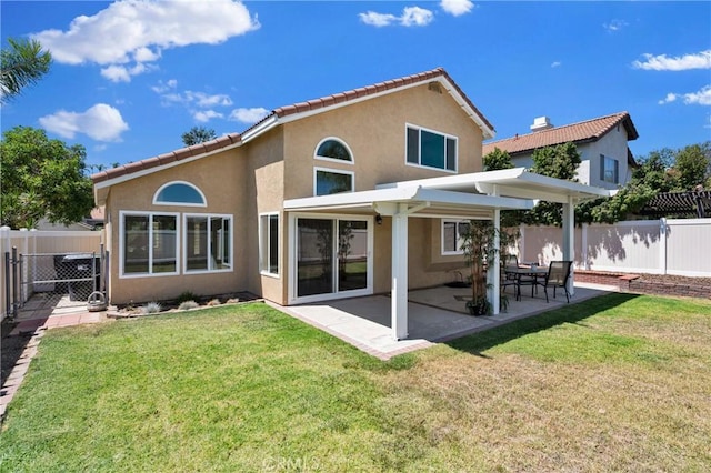 1850 Coolidge St, Corona, CA 92879 - back of house featuring stucco siding, a fenced backyard, a patio, and a tile roof