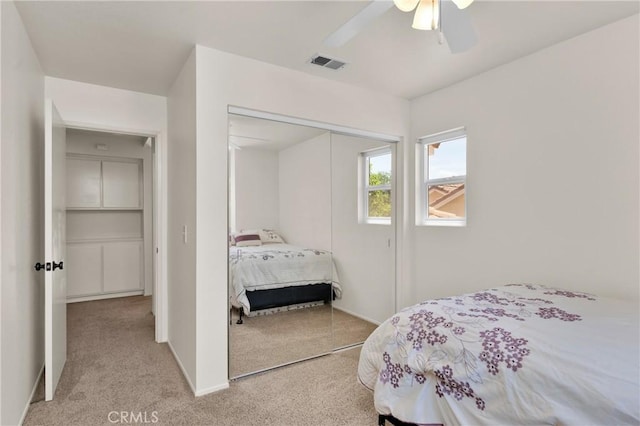 1850 Coolidge St, Corona, CA 92879 - bedroom with light colored carpet, a closet, and ceiling fan