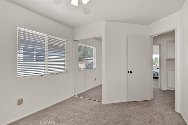 1850 Coolidge St, Corona, CA 92879 - unfurnished bedroom featuring carpet, multiple windows, a closet, and ceiling fan