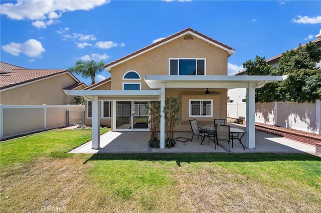 1850 Coolidge St, Corona, CA 92879 - rear view of property featuring a ceiling fan, a fenced backyard, stucco siding, and a patio