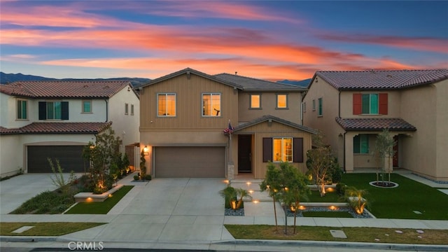 2227 Melogold Way, Corona, CA 92883 - view of front facade featuring driveway, a garage, stucco siding, and a tiled roof