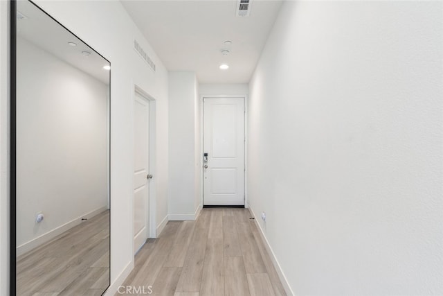2227 Melogold Way, Corona, CA 92883 - corridor with light wood-style flooring and recessed lighting