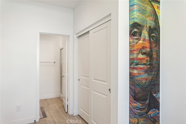 2227 Melogold Way, Corona, CA 92883 - corridor featuring light wood finished floors and baseboards