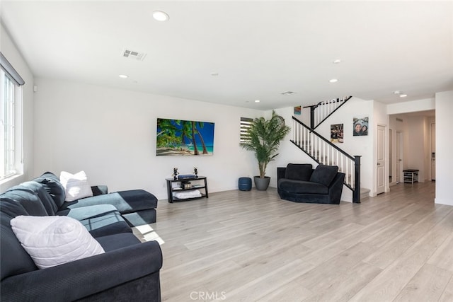 2227 Melogold Way, Corona, CA 92883 - living room with stairway, plenty of natural light, recessed lighting, and light wood-style flooring