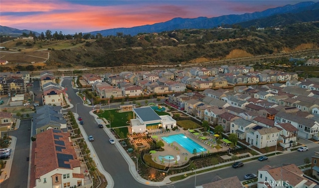 2227 Melogold Way, Corona, CA 92883 - aerial view of property and surrounding area with a mountain backdrop and nearby suburban area