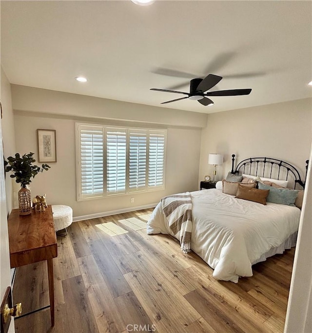1521 S Pomona Ave Unit A23, Fullerton, CA 92832 - bedroom featuring wood finished floors, recessed lighting, and a ceiling fan