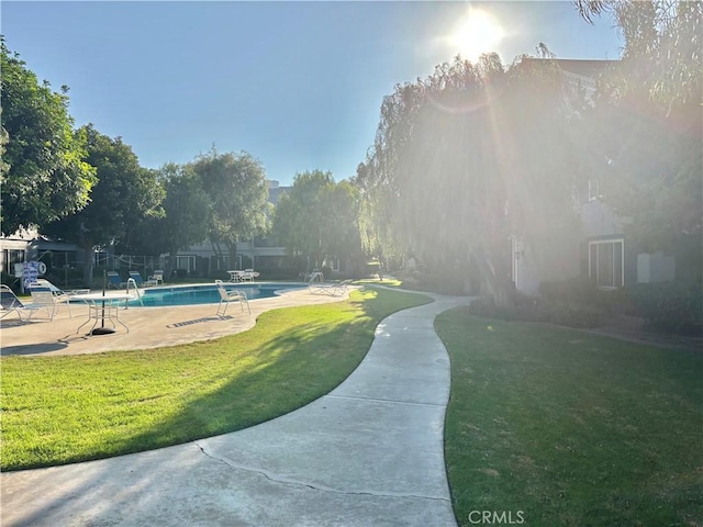 1521 S Pomona Ave Unit A23, Fullerton, CA 92832 - surrounding community with a yard, a pool, and a patio