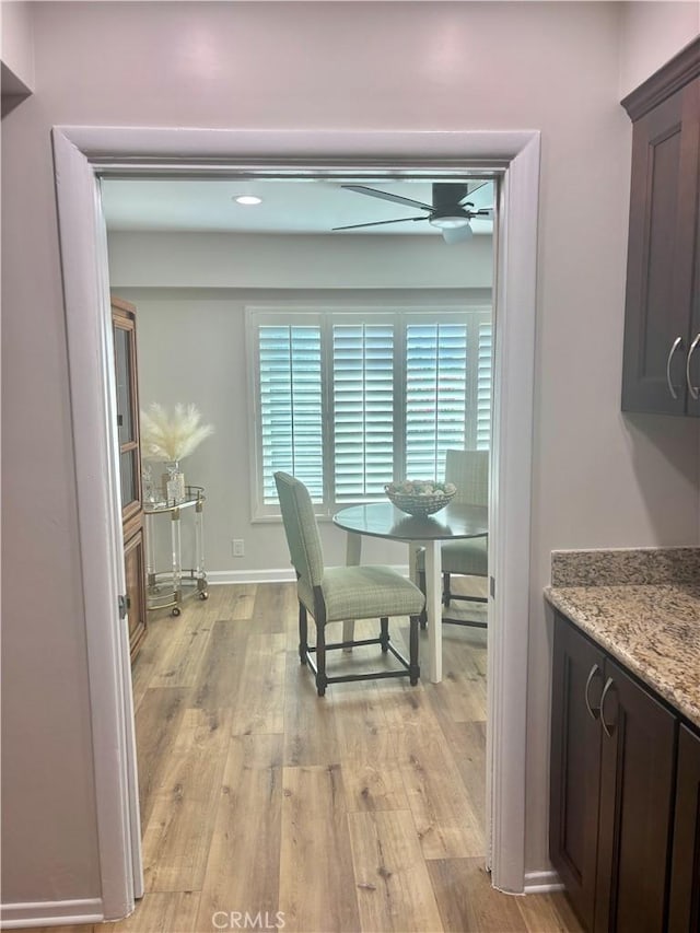 1521 S Pomona Ave Unit A23, Fullerton, CA 92832 - dining space featuring light wood finished floors and a ceiling fan