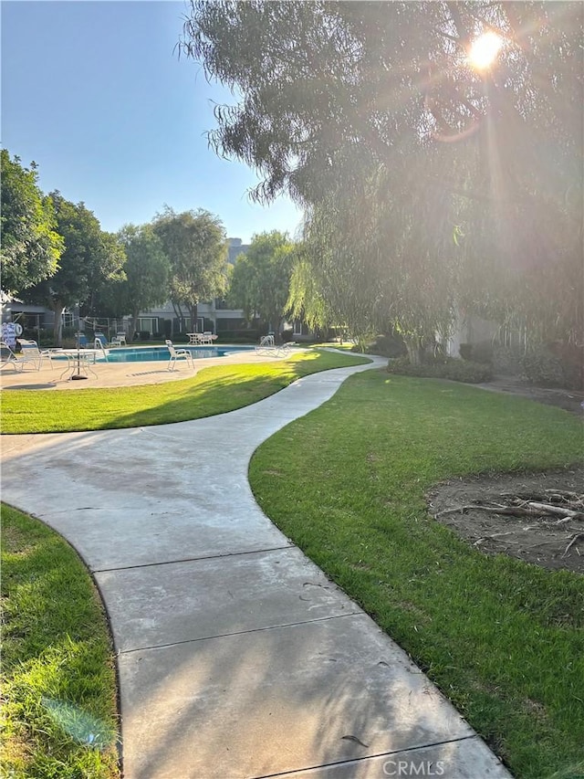 1521 S Pomona Ave Unit A23, Fullerton, CA 92832 - view of community featuring a swimming pool and a yard