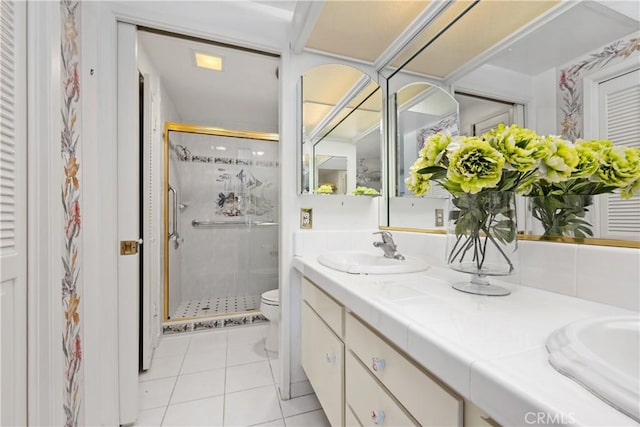 652 Via Zapata, Riverside, CA 92507 - bathroom with a shower stall, double vanity, and tile patterned floors