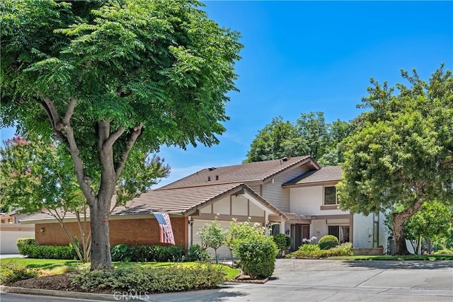 652 Via Zapata, Riverside, CA 92507 - view of front of property featuring a tile roof, stucco siding, and concrete driveway