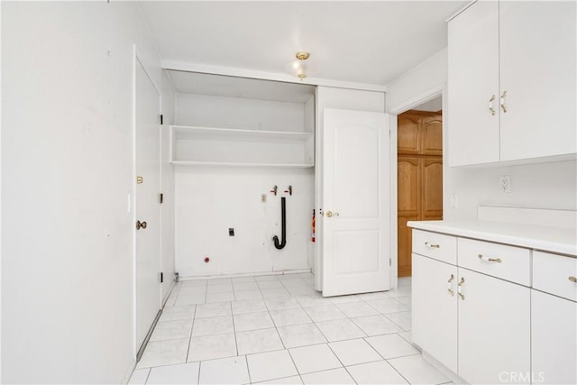 652 Via Zapata, Riverside, CA 92507 - laundry area featuring washer hookup, hookup for an electric dryer, and cabinet space