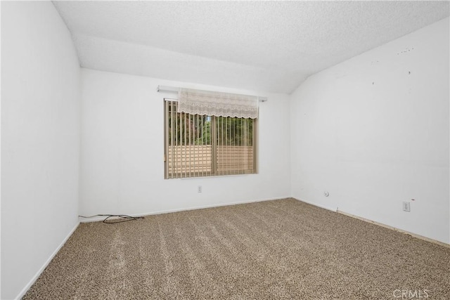652 Via Zapata, Riverside, CA 92507 - spare room featuring carpet flooring, lofted ceiling, and a textured ceiling