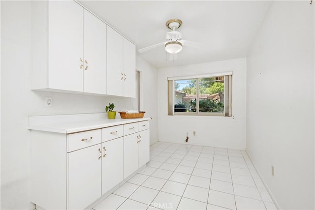 652 Via Zapata, Riverside, CA 92507 - kitchen featuring light countertops, white cabinetry, and ceiling fan