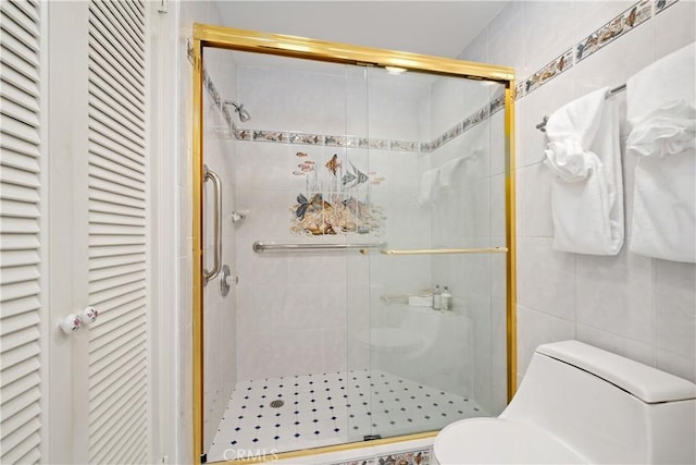 652 Via Zapata, Riverside, CA 92507 - full bathroom with a stall shower, tile walls, and a closet