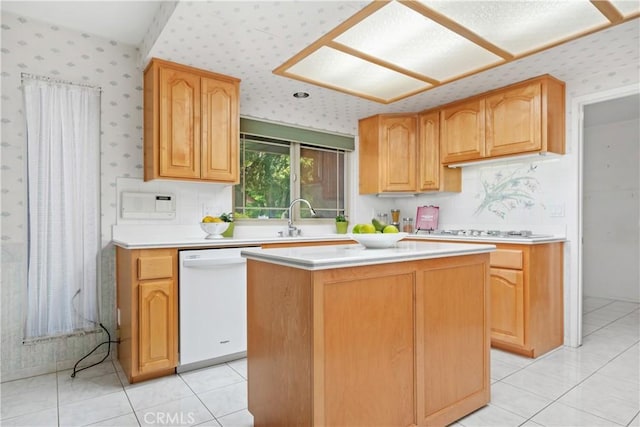 652 Via Zapata, Riverside, CA 92507 - kitchen with white dishwasher, wallpapered walls, gas stovetop, light countertops, and a kitchen island
