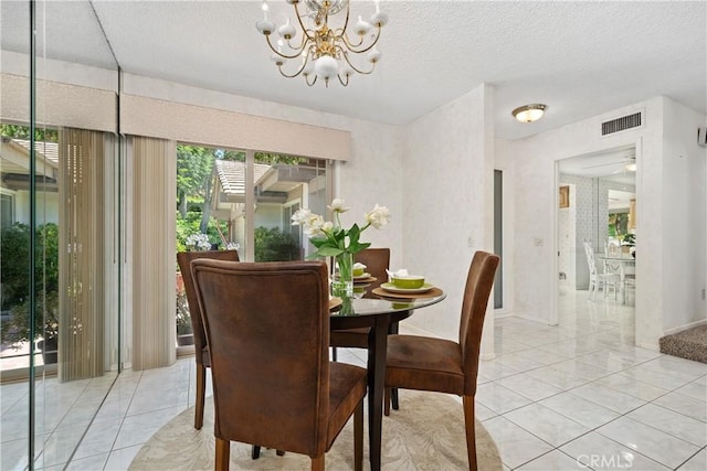 652 Via Zapata, Riverside, CA 92507 - dining space featuring a chandelier and a textured ceiling