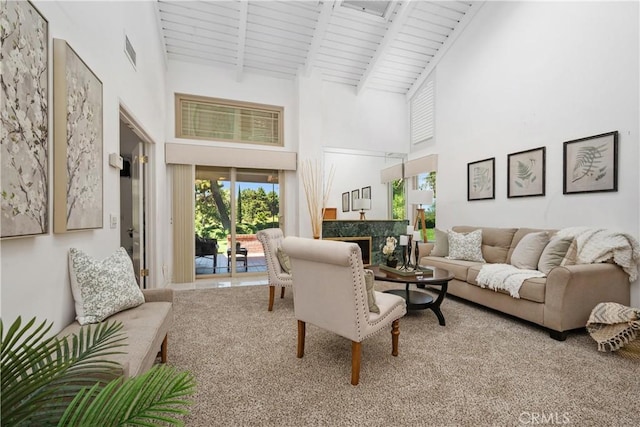 652 Via Zapata, Riverside, CA 92507 - carpeted living area with high vaulted ceiling, a fireplace, and a wooden ceiling with exposed beams
