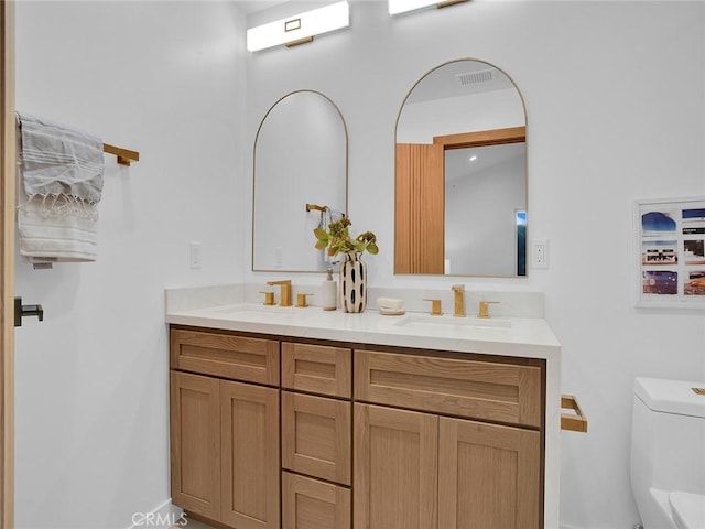 24100 Philiprimm St, Woodland Hills, CA 91367 - full bathroom with double vanity and toilet