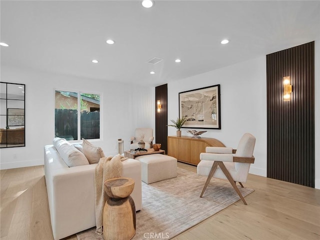24100 Philiprimm St, Woodland Hills, CA 91367 - living area with light wood-style flooring and recessed lighting