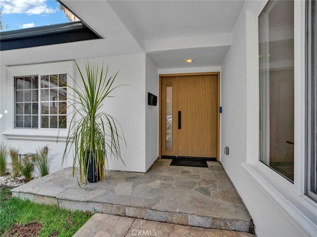 24100 Philiprimm St, Woodland Hills, CA 91367 - view of exterior entry featuring stucco siding