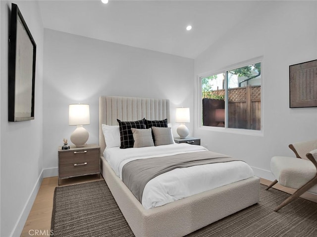 24100 Philiprimm St, Woodland Hills, CA 91367 - bedroom with vaulted ceiling, recessed lighting, and wood finished floors