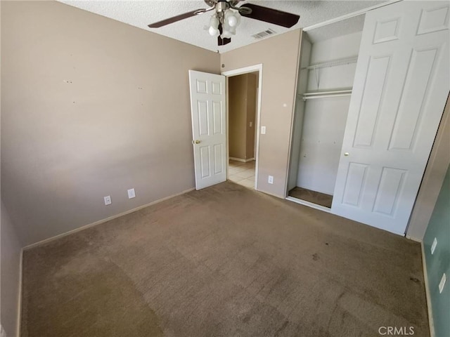 441 River Vly, Blythe, CA 92225 - unfurnished bedroom featuring carpet floors, a closet, ceiling fan, and a textured ceiling