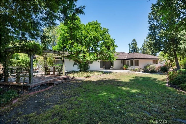 8 Coveview Dr, Rancho Palos Verdes, CA 90275 - back of house with a pergola, a deck, a lawn, stucco siding, and a patio