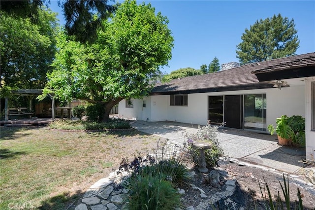 8 Coveview Dr, Rancho Palos Verdes, CA 90275 - back of property with a yard, a patio area, and stucco siding