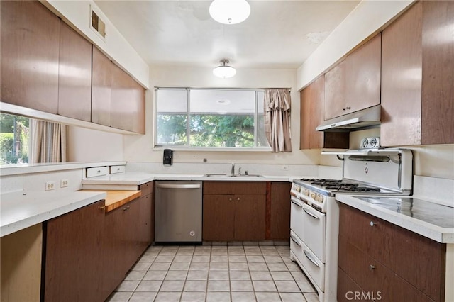 8 Coveview Dr, Rancho Palos Verdes, CA 90275 - kitchen featuring dishwasher, under cabinet range hood, white range with gas stovetop, and plenty of natural light