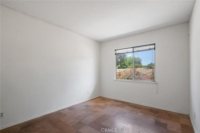 8 Coveview Dr, Rancho Palos Verdes, CA 90275 - empty room with baseboards and a textured ceiling