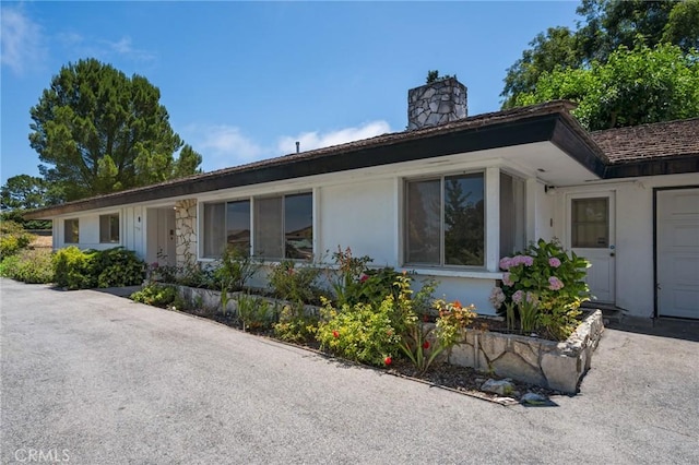 8 Coveview Dr, Rancho Palos Verdes, CA 90275 - single story home with a chimney and a garage