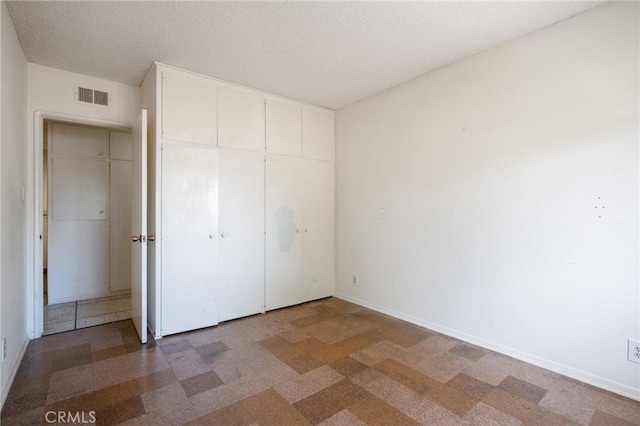 8 Coveview Dr, Rancho Palos Verdes, CA 90275 - unfurnished bedroom with a closet and a textured ceiling
