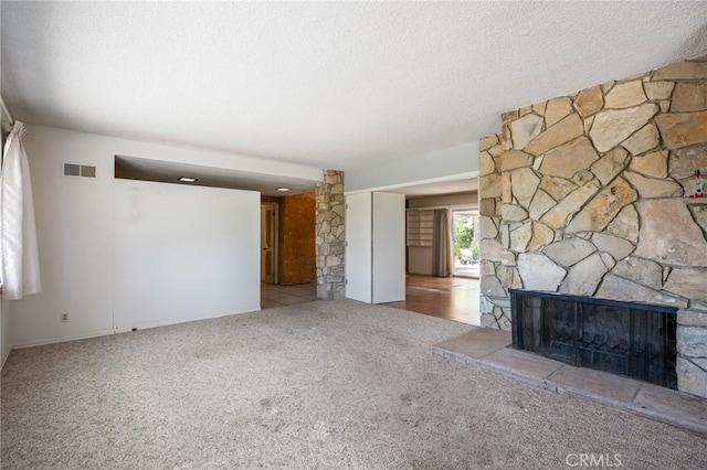 8 Coveview Dr, Rancho Palos Verdes, CA 90275 - unfurnished living room featuring carpet, a fireplace, and a textured ceiling