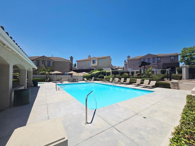 2811 Bear Valley Rd, Chula Vista, CA 91915 - community pool featuring a residential view and a patio area