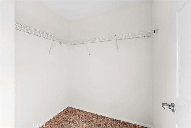 27132 Golden Field Ct, Moreno Valley, CA 92555 - spacious closet with carpet flooring