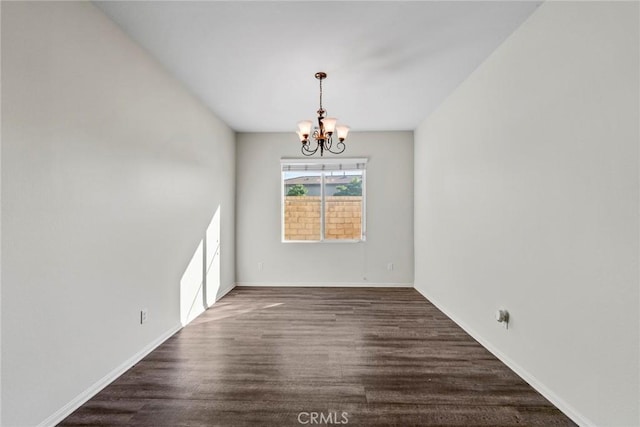 27132 Golden Field Ct, Moreno Valley, CA 92555 - empty room featuring a chandelier and wood finished floors