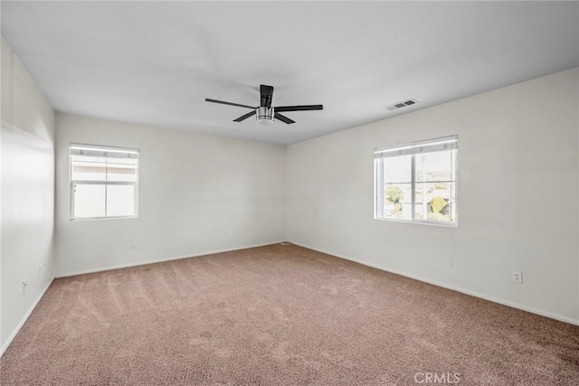 27132 Golden Field Ct, Moreno Valley, CA 92555 - carpeted spare room featuring healthy amount of natural light and ceiling fan
