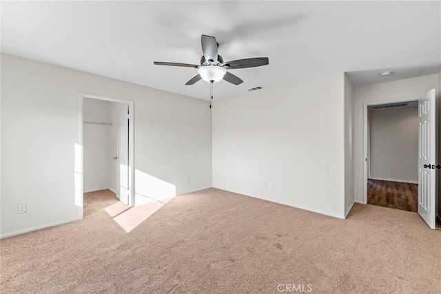 27132 Golden Field Ct, Moreno Valley, CA 92555 - unfurnished bedroom featuring carpet, a spacious closet, and a ceiling fan
