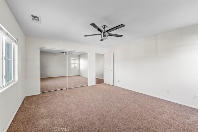 27132 Golden Field Ct, Moreno Valley, CA 92555 - unfurnished bedroom with carpet floors, a closet, and ceiling fan
