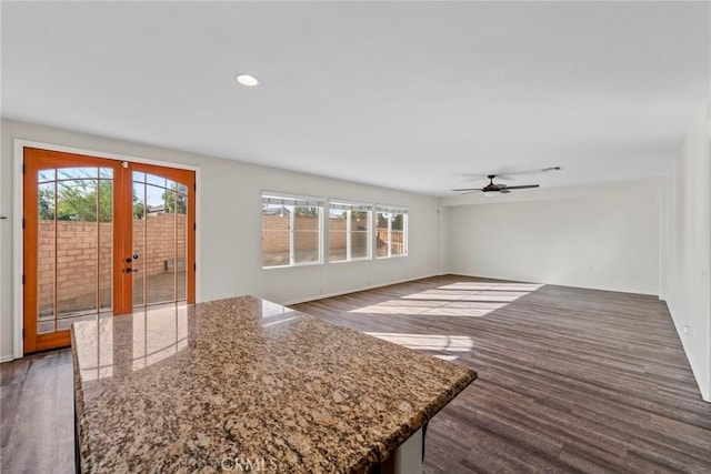 27132 Golden Field Ct, Moreno Valley, CA 92555 - unfurnished living room featuring healthy amount of natural light, french doors, ceiling fan, dark wood-style flooring, and recessed lighting
