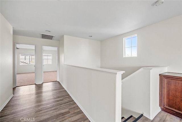 27132 Golden Field Ct, Moreno Valley, CA 92555 - corridor with an upstairs landing and wood finished floors