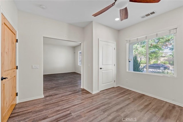 27132 Golden Field Ct, Moreno Valley, CA 92555 - unfurnished bedroom with wood finished floors, ceiling fan, a closet, and recessed lighting