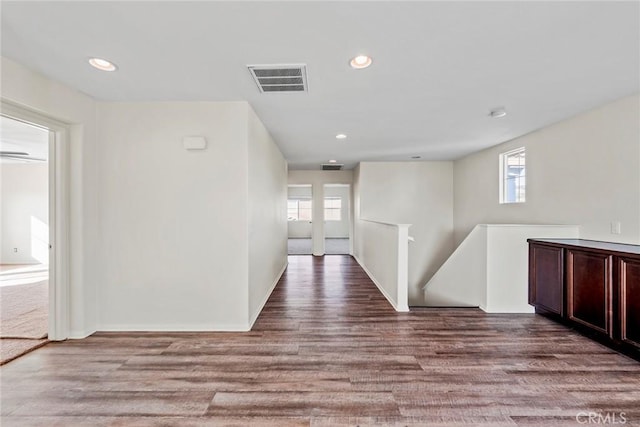 27132 Golden Field Ct, Moreno Valley, CA 92555 - corridor featuring healthy amount of natural light, wood finished floors, recessed lighting, and an upstairs landing